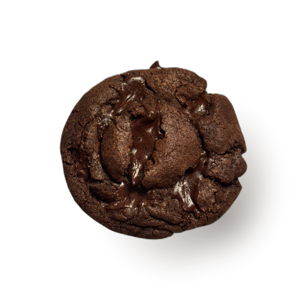 A double chocolate cookie resting beside a handwritten letter